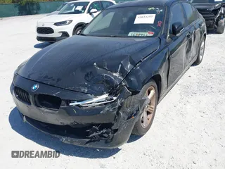 2013 BMW 3 Series 328i with VIN WBA3C1C57DF434854, listed as a IAAI auction lot 42023257 with 125,960 mi miles and . Bid and sale history available at carsss.com. Image 6.