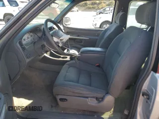 2001 Ford Explorer Sport z VIN 1FMYU70E61UC86910, wystawiony jako Copart lot #71248374 z przebiegiem 163 973 mil mil oraz Szkody całkowita. Historia ofert i sprzedaży dostępna na DreamBid. Obrazek 7.
