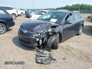 2014 Chevrolet Cruze 1LT with VIN 1G1PC5SB2E7238098, listed as a IAAI auction lot 42577348 with 84,964 mi miles and . Bid and sale history available at DreamBid. Image 2.