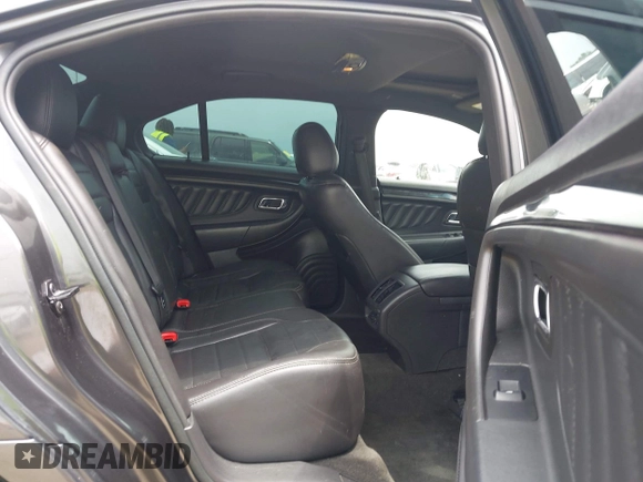 2015 Ford Taurus SHO with VIN 1FAHP2KT9FG114036, listed as a IAAI auction lot 42227276 with 146,285 mi miles and . Bid and sale history available at DreamBid. Image 8.