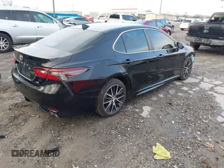 2022 Toyota Camry SE with VIN 4T1G11AK4NU640970, listed as a IAAI auction lot 41124147 with 33,472 mi miles and . Bid and sale history available at DreamBid. Image 4.