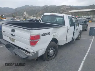 2014 Ford F-150 XL with VIN 1FTFX1CF3EKF95627, listed as a IAAI auction lot 42042775 with 208,405 mi miles and . Bid and sale history available at DreamBid. Image 4.