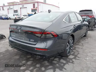 2024 Honda Accord Touring with VIN 1HGCY2F82RA070008, listed as a IAAI auction lot 42027911 with 13,878 mi miles and . Bid and sale history available at DreamBid. Image 4.