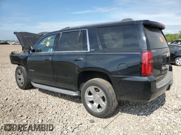 2015 Chevrolet Tahoe LTZ with VIN 1GNSKCKC2FR289034, listed as a Copart auction lot 57067225 with Not provided miles and Salvage title. Bid and sale history available at DreamBid. Image 2.