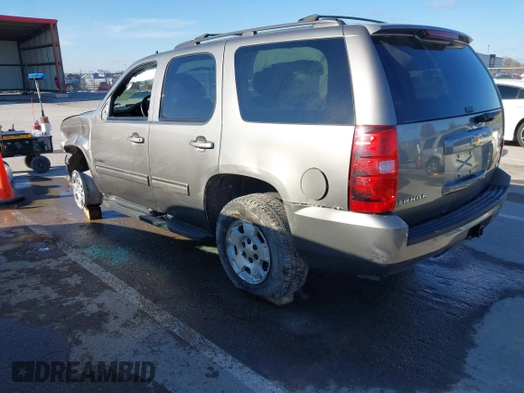 2012 Chevrolet Tahoe LS with VIN 1GNSKAE05CR278255, listed as a IAAI auction lot 41054601 with 205,470 mi miles and . Bid and sale history available at DreamBid. Image 3.