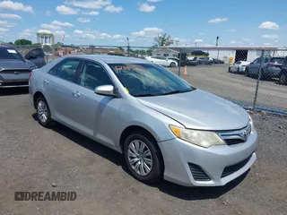 2012 Toyota Camry L z VIN 4T1BF1FKXCU151409, wystawiony jako IAAI lot #42385013 z przebiegiem 196 741 mil mil oraz . Historia ofert i sprzedaży dostępna na DreamBid. Obrazek 1.