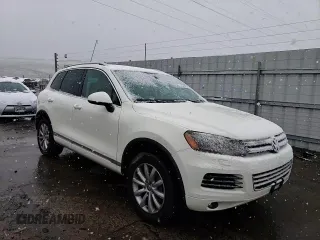 2011 Volkswagen Touareg Sport with VIN WVGFF9BP8BD002982, listed as a Copart auction lot 53958555 with 156,742 mi miles and Salvage Title. Bid and sale history available at DreamBid. Image 14.