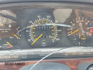 1990 Mercedes-Benz 560 with VIN WDBCA45E9LA549067, listed as a IAAI auction lot 41849642 with 124,516 mi miles and . Bid and sale history available at DreamBid. Image 7.