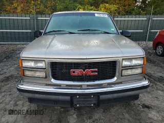 1999 GMC Suburban z VIN 3GKEC16R4XG536985, wystawiony jako Copart lot #73421824 z przebiegiem 181 327 mil mil oraz Tytuł czysty. Historia ofert i sprzedaży dostępna na DreamBid. Obrazek 5.