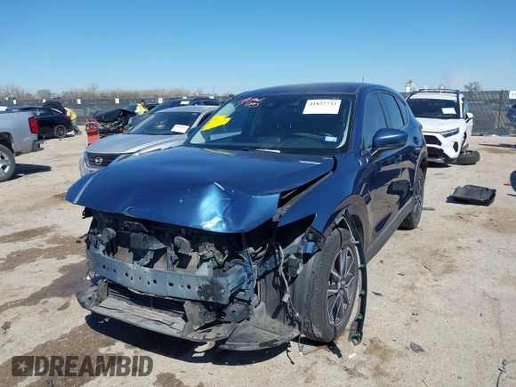 2018 Mazda CX-5 Touring with VIN JM3KFBCM0J0302916, listed as a IAAI auction lot 41837733 with 100,765 mi miles. Bid and sale history available at carsss.com. Image 18.