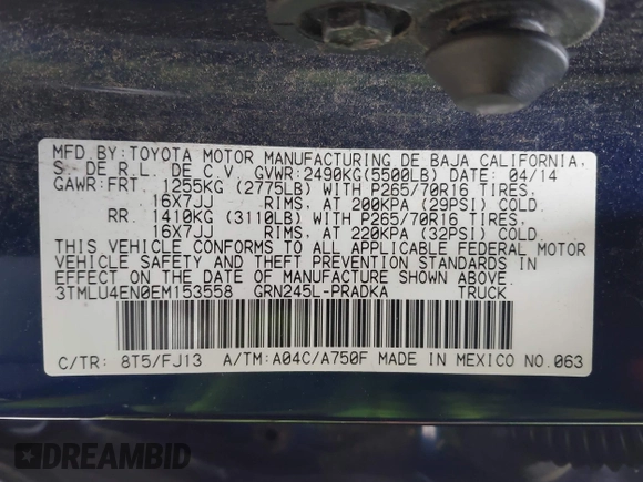 2014 Toyota Tacoma with VIN 3TMLU4EN0EM153558, listed as a IAAI auction lot 41964890 with 140,864 mi miles and . Bid and sale history available at DreamBid. Image 9.