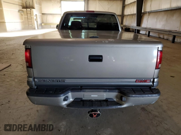 2000 GMC Sonoma SLS z VIN 1GTCS19W0Y8146125, wystawiony jako Copart lot #71576724 z przebiegiem 73 854 mil mil oraz Szkody całkowita. Historia ofert i sprzedaży dostępna na DreamBid. Obrazek 6.