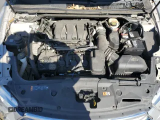 2015 Ford Taurus SE with VIN 1FAHP2D84FG149799, listed as a Copart auction lot 88993345 with 114,131 mi miles and Salvage Title. Bid and sale history available at DreamBid. Image 12.