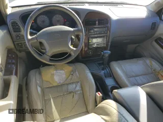 2000 Infiniti QX4 z VIN JNRAR07Y4YW085424, wystawiony jako Copart lot #81091324 z przebiegiem 202 157 mil mil oraz Szkoda całkowita • Salvage title. Historia ofert i sprzedaży dostępna na DreamBid. Obrazek 8.