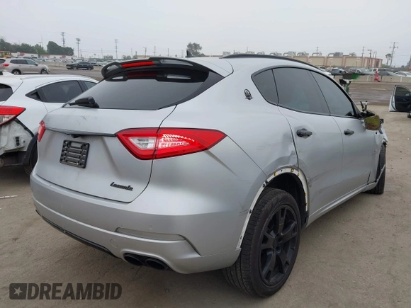 2017 Maserati Levante with VIN ZN661XUSXHX216080, listed as a IAAI auction lot 42024196 with 98,842 mi miles. Bid and sale history available at carsss.com. Image 4.