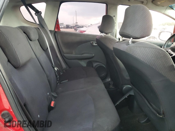2013 Honda Fit Sport z VIN JHMGE8H62DC003850, wystawiony jako Copart lot #55141065 z przebiegiem 266 938 mil mil oraz Szkoda całkowita • Salvage title. Historia ofert i sprzedaży dostępna na DreamBid. Obrazek 10.