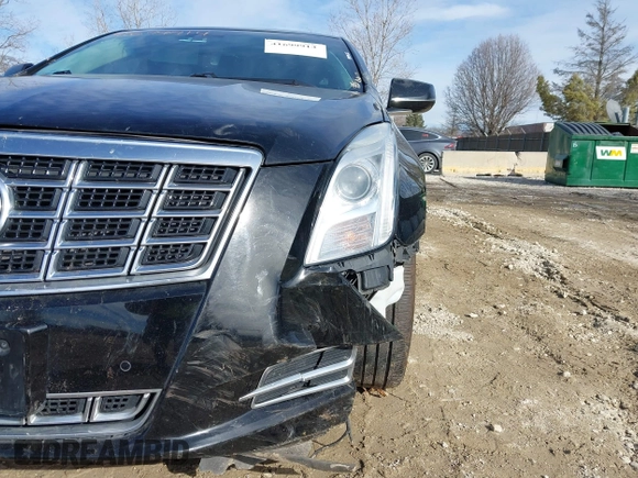 2015 Cadillac XTS Luxury z VIN 2G61N5S35F9155543, wystawiony jako IAAI lot #41699914 z przebiegiem 120 700 mil mil oraz . Historia ofert i sprzedaży dostępna na DreamBid. Obrazek 12.