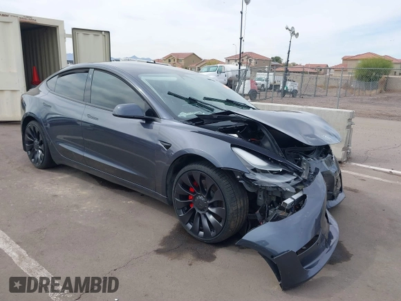 2022 Tesla Model 3 Performance with VIN 5YJ3E1EC3NF296891, listed as a IAAI auction lot 41808329 with 82,682 mi miles and . Bid and sale history available at DreamBid. Image 1.