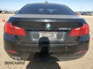 2014 BMW 5 Series 535d with VIN WBAXA5C51ED690385, listed as a Copart auction lot 57290645 with 161,694 mi miles and Salvage title. Bid and sale history available at DreamBid. Image 6.