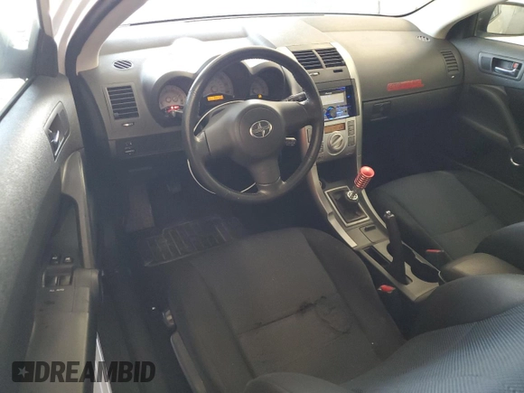 2005 Scion tC z VIN JTKDE177650011368, wystawiony jako Copart lot #56408015 z przebiegiem 165 731 mil mil oraz Szkoda całkowita • Salvage title. Historia ofert i sprzedaży dostępna na DreamBid. Obrazek 8.