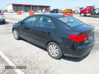 2012 Kia Forte EX with VIN KNAFU4A20C5556285, listed as a IAAI auction lot 42064717 with 134,545 mi miles. Bid and sale history available at carsss.com. Image 3.
