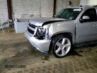 2013 Chevrolet Suburban LT with VIN 1GNSCJE00DR260275, listed as a Copart auction lot 50394425 with 140,464 mi miles and Salvage title. Bid and sale history available at DreamBid. Image 12.