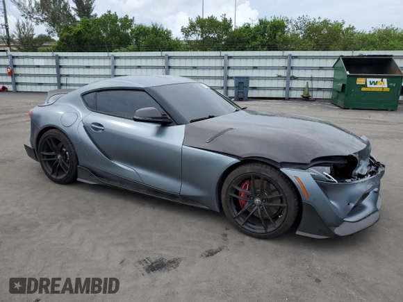 2022 Toyota Supra 3.0 with VIN WZ1DB0C09NW047931, listed as a Copart auction lot 59527955 with 61,941 mi miles and Salvage title. Bid and sale history available at DreamBid. Image 4.