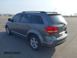 2012 Dodge Journey SXT z VIN 3C4PDCBG9CT208092, wystawiony jako IAAI lot #42065471 z przebiegiem 208 794 mil mil oraz . Historia ofert i sprzedaży dostępna na DreamBid. Obrazek 3.