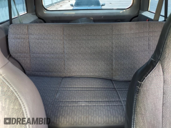1998 Jeep Cherokee Sport with VIN 1J4FJ68SXWL210381, listed as a Copart auction lot 58398995 with 211,870 mi miles and Salvage title. Bid and sale history available at DreamBid. Image 10.