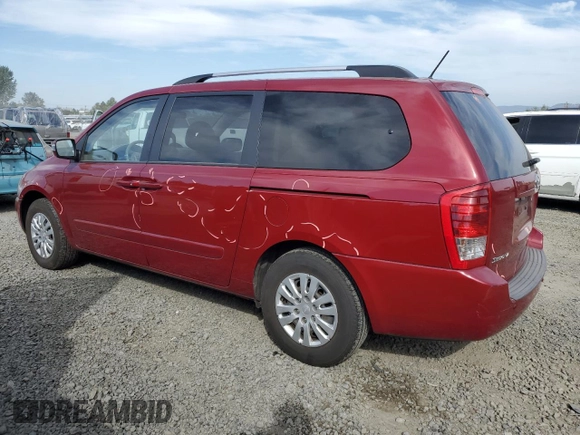 2011 Kia Sedona LX with VIN KNDMG4C72B6369858, listed as a Copart auction lot 70339124 with 165,640 mi miles and Salvage Title. Bid and sale history available at carsss.com. Image 2.