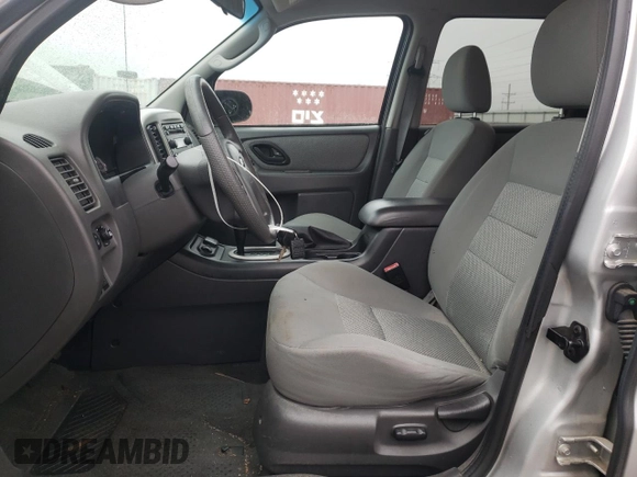 2006 Ford Escape Hybrid with VIN 1FMCU95H86KA52599, listed as a Copart auction lot 81271374 with 188,355 mi miles and Salvage title. Bid and sale history available at DreamBid. Image 7.