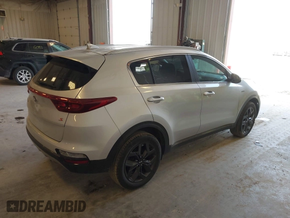 2020 Kia Sportage S with VIN KNDP6CAC3L7813464, listed as a IAAI auction lot 42128252 with 76,271 mi miles. Bid and sale history available at carsss.com. Image 4.