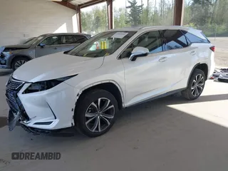 2021 Lexus RX with VIN JTJHZKFA2M2030841, listed as a IAAI auction lot 42009263 with 38,113 mi miles. Bid and sale history available at carsss.com. Image 18.