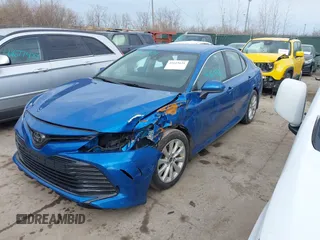 2020 Toyota Camry LE with VIN 4T1C11AKXLU401967, listed as a IAAI auction lot 41619121 with 94,962 mi miles. Bid and sale history available at carsss.com. Image 2.