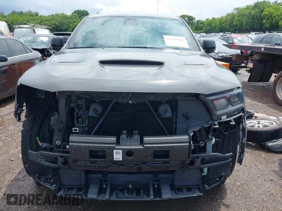 2022 Dodge Durango GT Plus with VIN 1C4RDJDG1NC213263, listed as a IAAI auction lot 42639103 with 77,061 mi miles and . Bid and sale history available at DreamBid. Image 12.