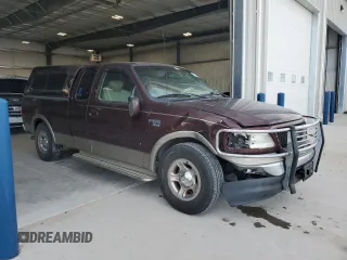 2001 Ford F-150 XL with VIN 1FTRX17W71NA45086, listed as a Copart auction lot 54182945 with 173,998 mi miles and Salvage title. Bid and sale history available at DreamBid. Image 4.