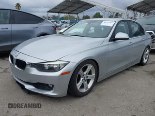 2014 BMW 3 Series 328i with VIN WBA3C1C53EK109613, listed as a IAAI auction lot 41713060 with 141,240 mi miles. Bid and sale history available at carsss.com. Image 2.