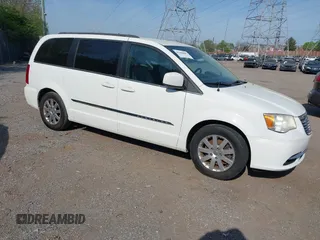 2013 Chrysler Town & Country Touring with VIN 2C4RC1BG9DR744836, listed as a IAAI auction lot 42104087 with 159,482 mi miles. Bid and sale history available at carsss.com. Image 1.