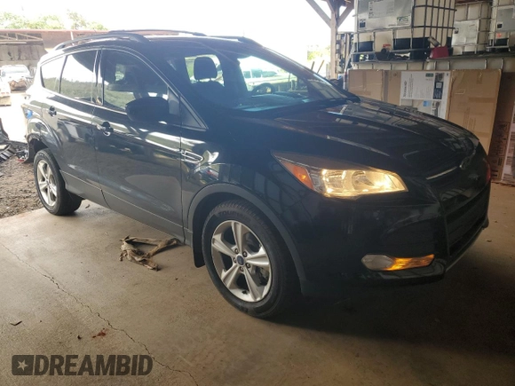 2015 Ford Escape SE with VIN 1FMCU9GXXFUB63549, listed as a Copart auction lot 48187765 with 40,554 mi miles and Salvage Title. Bid and sale history available at DreamBid. Image 4.