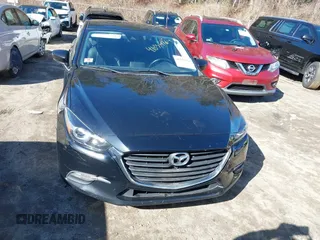 2018 Mazda 3 Touring with VIN 3MZBN1V34JM208669, listed as a IAAI auction lot 41834164 with 117,639 mi miles. Bid and sale history available at carsss.com. Image 12.