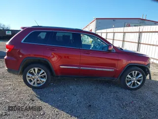 2013 Jeep Grand Cherokee Laredo with VIN 1C4RJEAG6DC636780, listed as a IAAI auction lot 41127701 with 135,026 mi miles. Bid and sale history available at carsss.com. Image 14.