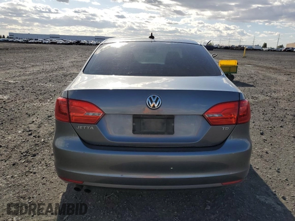 2014 Volkswagen Jetta TDI w/Premium with VIN 3VW3L7AJ4EM273755, listed as a Copart auction lot 52389795 with 184,586 mi miles and Salvage title. Bid and sale history available at DreamBid. Image 6.