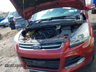 2015 Ford Escape Titanium with VIN 1FMCU0JX8FUA89049, listed as a IAAI auction lot 41988611 with 277,003 mi miles. Bid and sale history available at carsss.com. Image 10.
