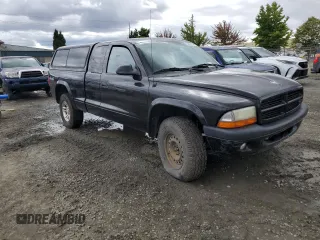 2003 Dodge Dakota Sport with VIN 1D7HG32N43S102313, listed as a Copart auction lot 70307144 with 139,079 mi miles and Salvage Title. Bid and sale history available at carsss.com. Image 4.