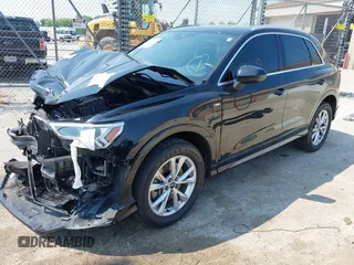 2021 Audi Q3 S line Premium Plus with VIN WA1EECF31M1068473, listed as a IAAI auction lot 42431540 with 42,312 mi miles and . Bid and sale history available at DreamBid. Image 2.