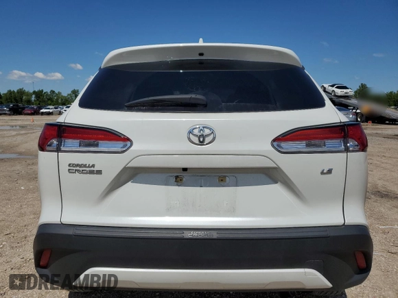 2023 Toyota Corolla Cross LE z VIN 7MUCAAAG1PV066534, wystawiony jako Copart lot #56206465 z przebiegiem 20 792 mil mil oraz Szkoda całkowita • Salvage title. Historia ofert i sprzedaży dostępna na DreamBid. Obrazek 6.