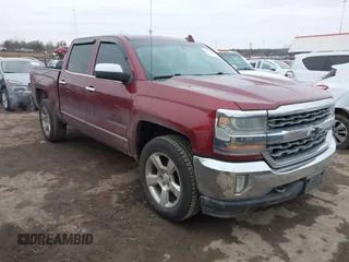 2016 Chevrolet Silverado 1500 LT with VIN 3GCUKREC9GG205499, listed as a IAAI auction lot 41557147 with 174,426 mi miles and . Bid and sale history available at DreamBid. Image 1.
