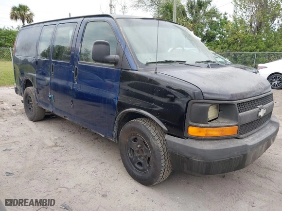 2004 Chevrolet Express Cargo Van with VIN 1GCFG15T541193566, listed as a IAAI auction lot 41613817 with 390,826 mi miles. Bid and sale history available at carsss.com. Image 1.