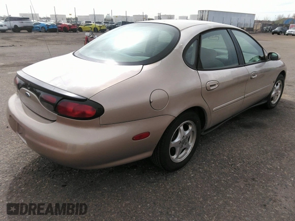 1999 Ford Taurus SE with VIN 1FAFP53S9XA330603, listed as a IAAI auction lot 41819819 with 207,025 mi miles. Bid and sale history available at carsss.com. Image 4.