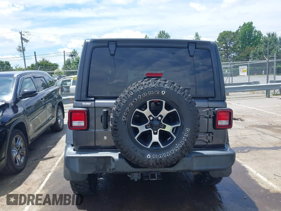 2019 Jeep Wrangler Unlimited Sport S with VIN 1C4HJXDN4KW577273, listed as a IAAI auction lot 42435847 with 69,403 mi miles and . Bid and sale history available at DreamBid. Image 16.